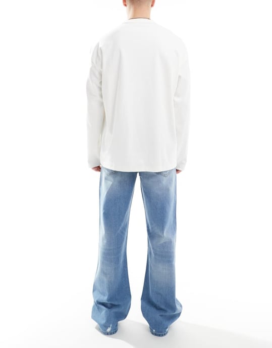 ASOS DESIGN wide flare jeans with tint & rips in mid wash blue - Image 2