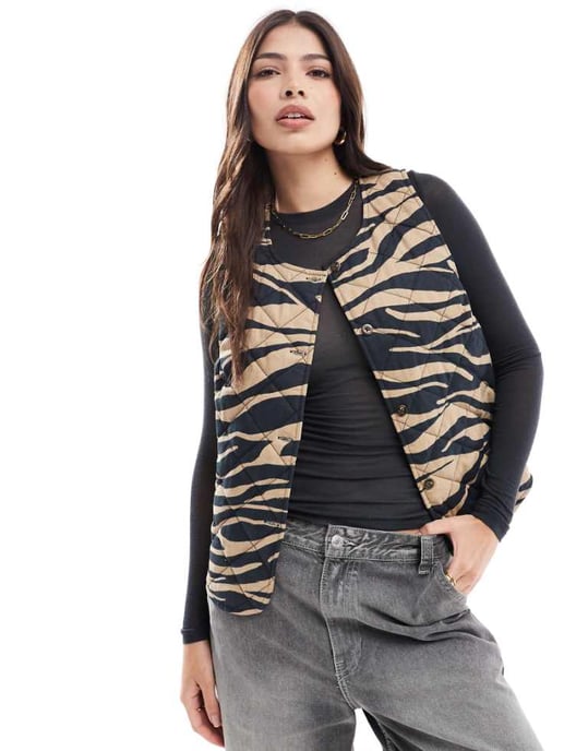 ASOS DESIGN button through quilted vest in animal print - Image 1