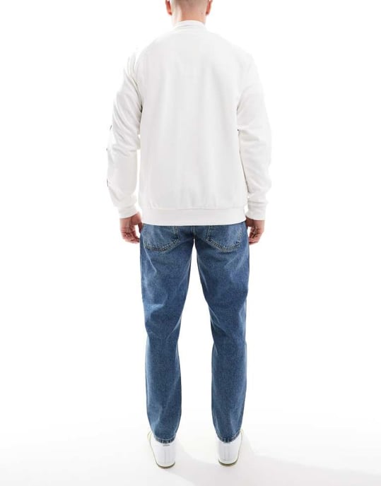 ASOS DESIGN tapered fit jeans in tinted dark wash blue - Image 3