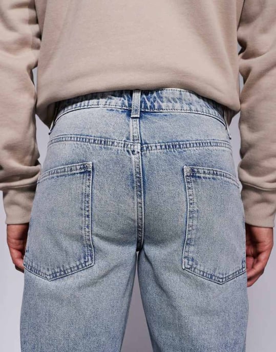 ASOS DESIGN tapered jeans i blekt tvätt - Image 4