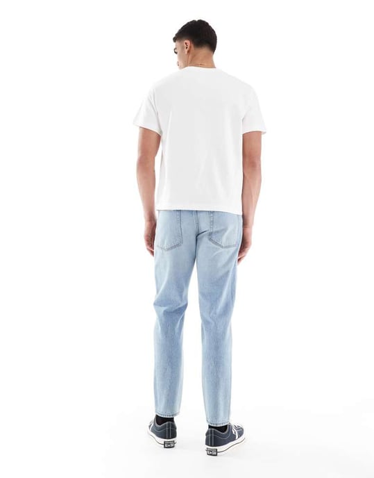 ASOS DESIGN tapered jeans i vintage ljusblå tvätt - Image 2