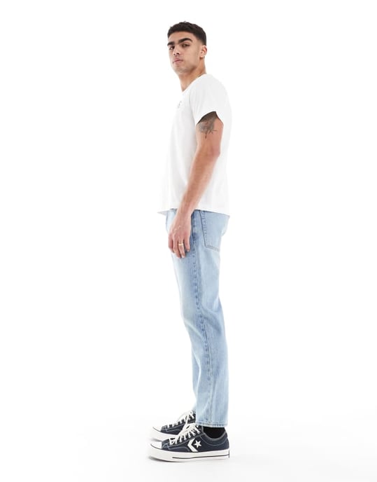 ASOS DESIGN tapered jeans i vintage ljusblå tvätt - Image 3