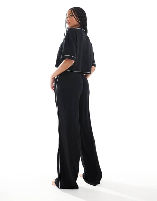 ASOS DESIGN Tall super soft slinky wide leg pyjama trouser in black with contrast binding - Image 3