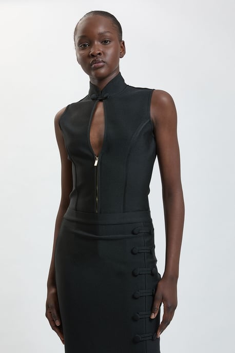 Military Detail Figure Form Bandage Sleeveless Knit Top - Image 1