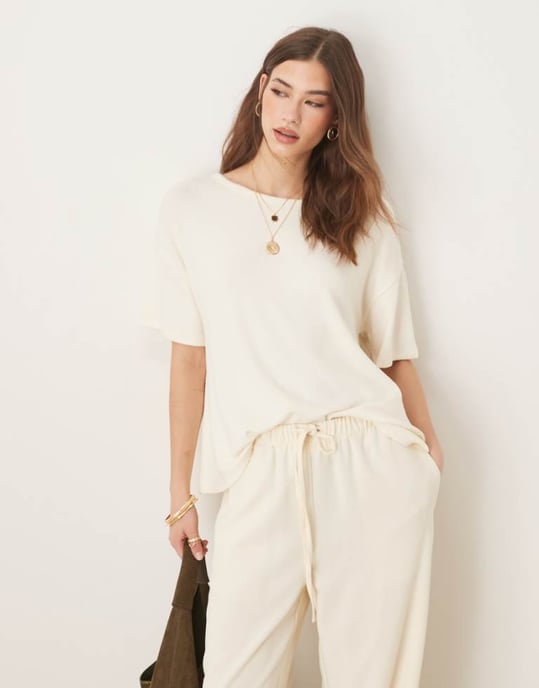 ASOS DESIGN textured knit hanky hem tee in cream - Image 1
