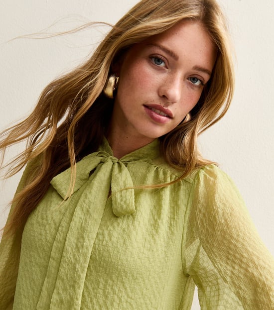 Groene top met strik en lange mouwen - Image 2