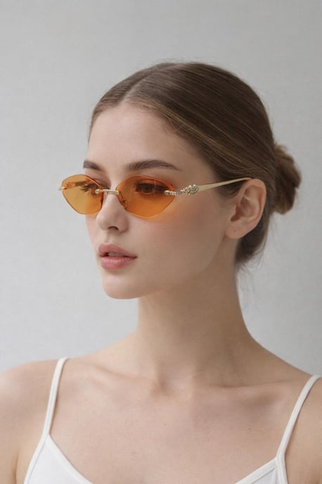Rimless Oval Geo Metal Sunglasses in Orange - Image 1