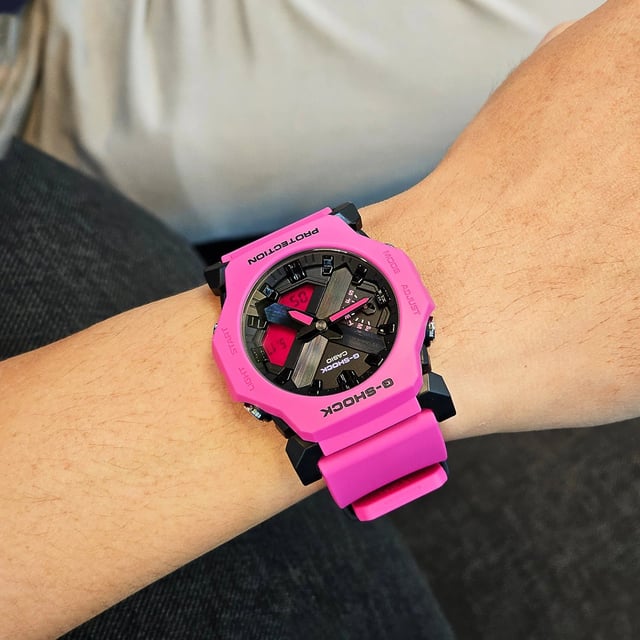 This Casio G-shock Analogue-Digital Watch for Women is the perfect timepiece to wear or to gift. It's Pink 40 mm Round case combined with the comfortable Pink Plastic watch band will ensure you enjoy this stunning timepiece without any compromise. Operated by a high quality Quartz movement and water resistant to 20 bars, your watch will keep ticking. Vintage fashion meets modern functionality, delivering retro styling with up-to-date features. This Analogue-Digital watch has a calendar function: Day-Date as well as Stop Watch , Countdown , Worldtime , Alarm and Light High quality 19 cm length and 24 mm width Pink Plastic strap with a Buckle Case diameter: 40 mm,case thickness: 11 mm, case colour: Pink and dial colour: Black