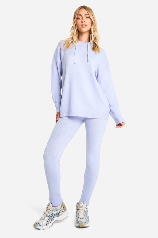 Soft knit co-ord set featuring a hoodie and trousers
        Relaxed fit hoodie with long sleeves and ribbed cuffs
        Matching high-waisted trousers with a slim fit
        Comfortable stretch fabric for all-day wear
        Versatile two-piece set for effortless styling
    
    Embrace comfort without compromising on style with this soft knit co-ord set from Boohoo. The relaxed fit hoodie pairs perfectly with the slim-fit trousers, creating a harmonious silhouette that's both trendy and cosy. Ideal for casual outings, this set can be dressed up or down with ease. Layer the hoodie over a simple tee and pair with trainers for a laid-back look, or style the trousers with a cropped top and heels for a night out with friends. The stretchy fabric ensures comfort for lounging at home or running errands. For a sporty twist, take inspiration from the model and team with chunky trainers and a roomy tote bag. This versatile co-ord is a must-have for the fashion-forward woman who values both comfort and style in her everyday wardrobe.