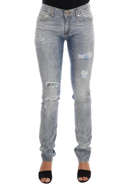 Absolutely stunning 100% Authentic brand new with tags
  Blue wash and torn cotton stretch jeans
  Mid waist slim fit
  Light blue wash
  Torn detailing
  Two front and two back pockets
  Logo on the back right pocket
  Zipper fly closure
  Made in Italy
  Material: 98% Cotton 2% Elastane (stretch)