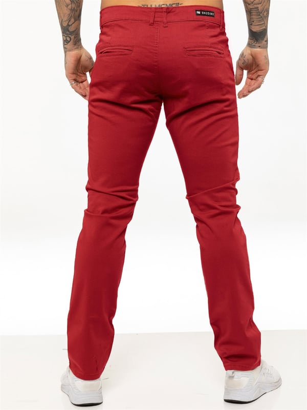 Indulge in the ultimate comfort and style with our ENZO Mens Designer Skinny Fit Chino Pants. Featuring a sleek zip fly fastening, two front pockets, two back welt pockets, and the signature Logo Branding on the Back Waist Patch