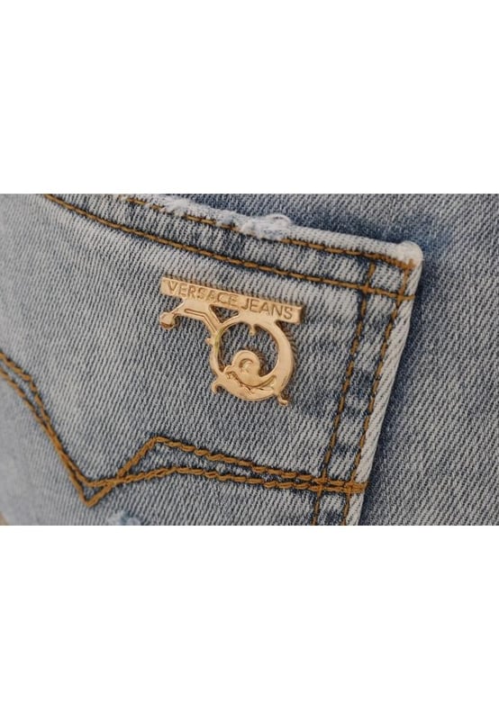 Absolutely stunning 100% Authentic brand new with tags
  Blue wash and torn cotton stretch jeans
  Mid waist slim fit
  Light blue wash
  Torn detailing
  Two front and two back pockets
  Logo on the back right pocket
  Zipper fly closure
  Made in Italy
  Material: 98% Cotton 2% Elastane (stretch)