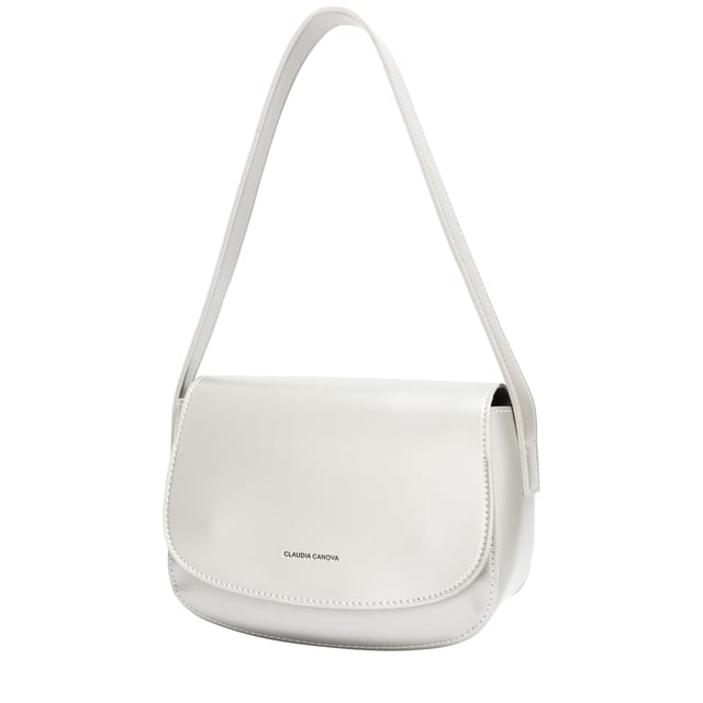 This smart unlined faux leather shoulder bag looks elegant and is designed for versatile use. With a handy exterior back pocket to store small essentials. The flap-over top fastens with a magnetic close. The Astrid single strap shoulder bag is an easy-to-wear wardrobe staple that can elevate any look.