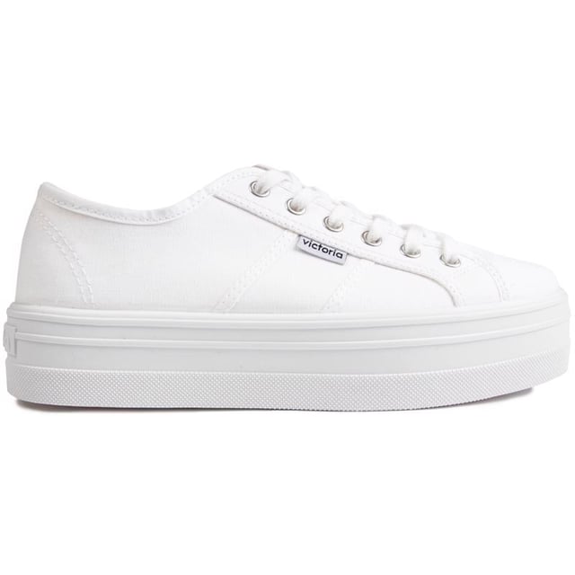 Bring Some Life And A Little Retro Vibe Into Your Trainer Collection, With The Women's Platform Plimsole From Victoria. Crafted From Strong Canvas, The Stylish All-in-white Trainers Are Finished With A Vulcanised Rubber Sole And Metal Eyelets.