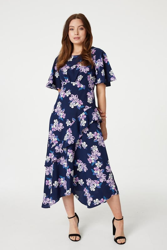 Add a pretty floral tea dress to your collection with this layered hem midi dress. It has a round neck, 1/2 angel sleeves, a zip back closure and a maxi length skirt with a tiered hemline. Pair with neutral strappy heels for a stylish look that's perfect for an evening out on holiday or a daytime wedding.