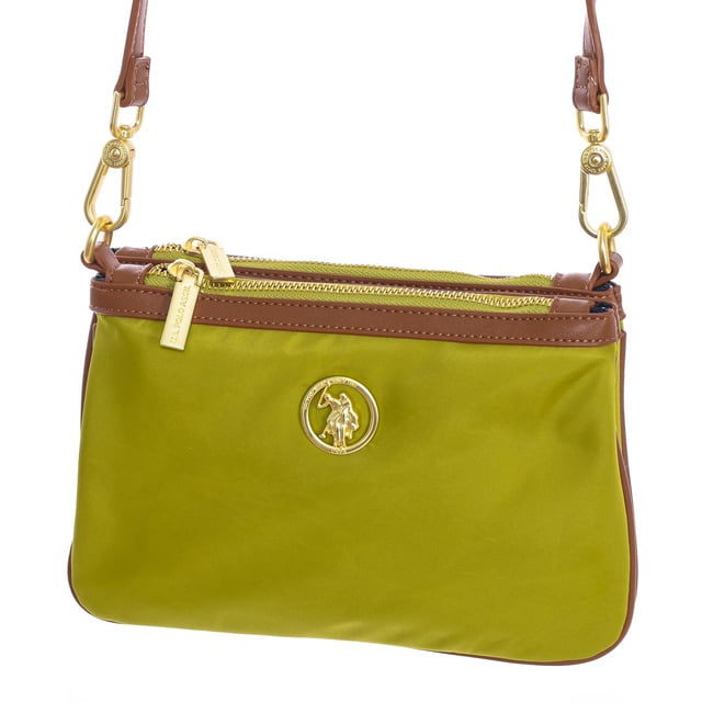 Crossbody bag U.S. POLO ASSN.
 Synthetic.
 Three compartments: two with zipper closure and one with magnet closure.
 Front interior: Two open pockets.
 Back interior: One zipper pocket.
 Adjustable removable strap.
 Interior lining with brand print.
 Brand logo on the front.
 Seams seen in tone.
 Measures: 25x17x3cm
 Composition: 70% Nylon, 30% Polyurethane
 Care:
Clean with a wet cloth.