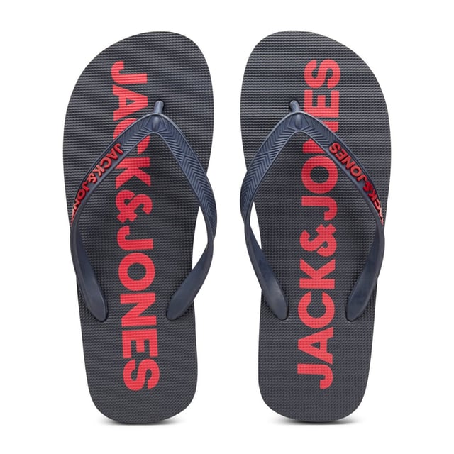 Slides Slip on Style with Round Toe

Jack & Jones Branding Name on Strap

Plain Solid Colour Slippers

Cushioned Foot Bed with Textured Branding Pattern and Rubber Flip Flop Sole

Highly Fashionable and an Ideal Present

Comfortable Inner Lining and Non-Slip Sole

Made of 100% Rubber