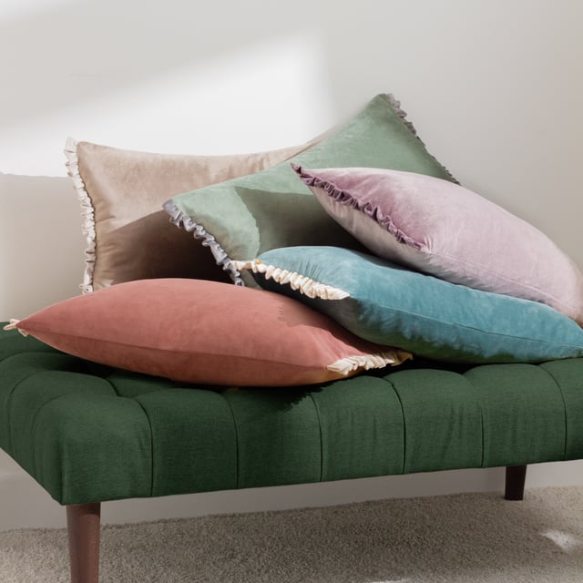 The Tilly cushion is made entirely of soft, opulent velvet and comes in a variety of soft pastel colours to help create a sophisticated look for your sofa. The dual-sided cottage core frill trim adds gravitas to the design, making it easy to combine with other larger cushions as part of a larger design scheme.