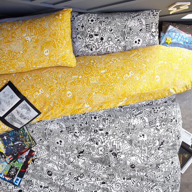 Express your creativity with this doodle duvet set. Featuring exciting notebook doodles of aliens, monsters, and spaceships. The excitement continues to the reverse a coordinating design on a yellow base so you can switch the look when you need to.