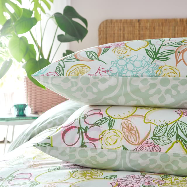 The infamous Moor's heads found in Sicily, Italy, served as the inspiration for the beautifully created Taormina duvet cover set. With its abundant flowers and patterned reverse of maiolica ceramic tiles, this bedding conveys a story of romance. An excellent way to incorporate abstract art into your home is with this duvet set.