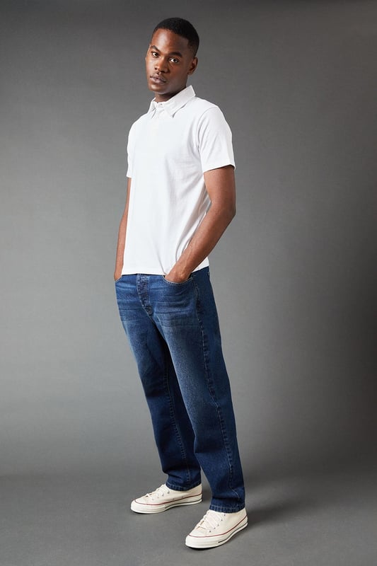 Classic regular fit polo design
        Short sleeves for warm-weather comfort
        Ribbed collar for a polished look
        Three-button placket for adjustable style
        Versatile solid colour for easy pairing
    
    This Burton regular fit polo shirt is the epitome of casual sophistication, perfect for the modern gent who values both style and comfort. Ideal for a variety of occasions, from casual Fridays at the office to weekend outings with mates, this polo effortlessly bridges the gap between relaxed and refined. The regular fit offers ample room for movement, making it a go-to choice for active days or leisurely pursuits. Style it with chinos and trainers for a smart-casual look that's spot-on for a pub lunch or family gathering. For a more laid-back vibe, pair it with your favourite jeans and a lightweight jacket. The versatility of this polo makes it a wardrobe essential, easily transitioning from daytime errands to evening catch-ups with friends. Its timeless design ensures you'll look put-together without trying too hard, embodying the effortless style that Burton is known for.