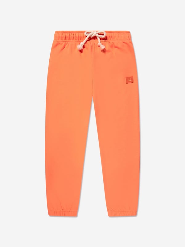 Acne Studios depict passion and underlying rebellion in their sustainable clothes. These unisex mandarin orange joggers capture the Swedish label's unapologetic and unconventional attitude. Crafted in refined cotton with an elasticated drawstring and cuffs. The minimalist look is signified by the petulant face of the embroidered logo. ‚ Back Ribbed Pocket ‚ 100% Cotton