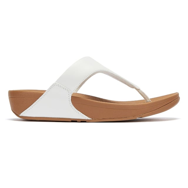 The minimalist Lulu sandals from FitFlop feature a timeless fabric-lined triangular vamp, along with legendary ergonomic Microwobbleboard™ midsoles, which deliver extraordinary comfort by not only absorbing shock but by diffusing underfoot pressure. This iteration boasts softly padded leather uppers for a classic finish.