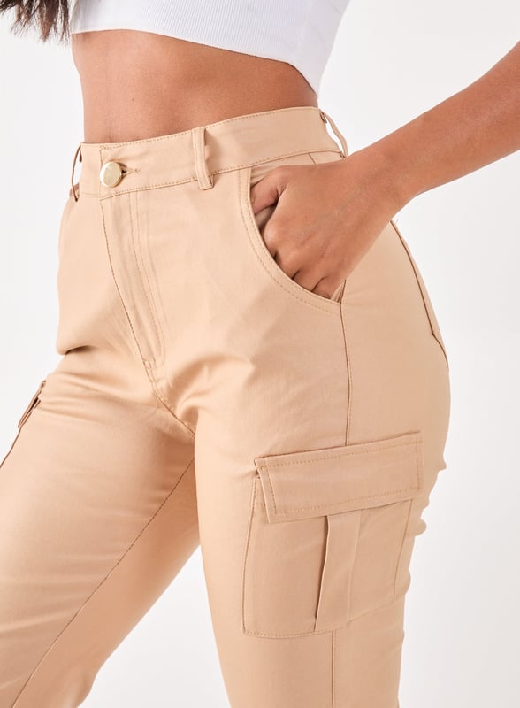 Featuring a PU material and buckle detailing. Team our Cuffed Cargo Trousers with your existing wardrobe pieces for a blogger-worthy look.