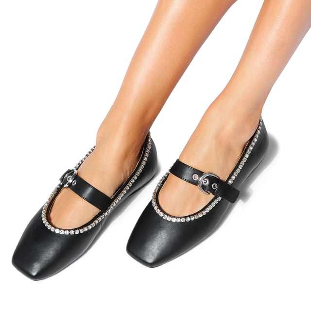 This KG Kurt Geiger Nico Stud is a Mary Jane style shoe with silver crystals around the edge of the shoe. There is a strap across the foot with large silver buckle fastening.