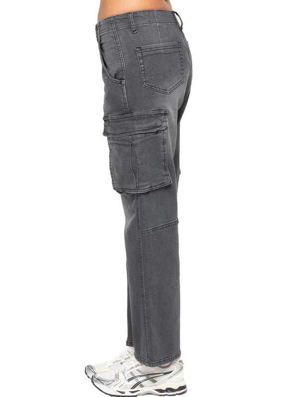 The Enzo Women's Cargo Straight Leg Jeans offer a stylish blend of utility and comfort, perfect for casual wear. These jeans feature a mid-rise waistband with a secure button closure and zip fly fastening. They are designed with a straight-leg silhouette, providing a relaxed and comfortable fit. Functionality meets style with six pockets: two front side pockets, two spacious cargo pockets with button closures on the sides, and two back pockets.