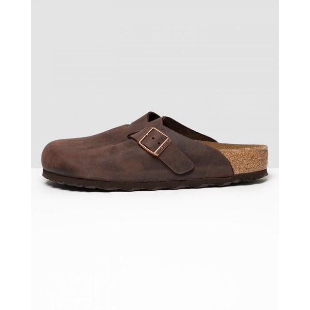 Men's Birkenstock Boston Leather Sandals in Brown Dating back to 1774 and originating from Germany BIRKENSTOCK is globally known for their signature footwear styles influenced by two and a half centuries of brand history. Providing comfort and durability they present these mens Boston Leather Slip On Shoes featuring their signature Birko-Flo skin-friendly material. Details: brown colourway adjustable buckle strap round toe cork footbed leather upper tonal stitching and embossed branding to side to complete.