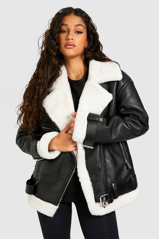 Take your outfit to new style heights with an aviator jacket. Perfect for layering, create a stylish oversized silhouette as you choose from crop belted jackets to faux fur lined options. A cross between a classic flight jacket and a leather biker, it's all about the detailing with this snug winter staple. Pair your aviator coat with high waisted mom jeans and a fierce attitude as you stroll your way through your social calendar.Style: Aviator JacketFabric: PULength: Regular