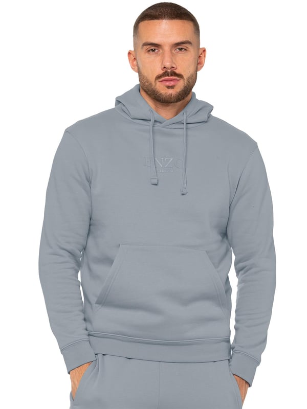 Enzo Mens Overhead Hoodie Tracksuit Set. Regular Fit, Long Sleeve Hoodie with Cuffed Wrists and Adjustable Drawstrings. Features EZ Logo On Chest And Joggers. Regular Fit Cargo Jogger. Elasticated Waistband With Adjustable Drawstring. Features 2 Side Slash Pockets, 2 Cargo Pockets, Single Welt Back Pocket. Ideal to use for Casual and Work wear.