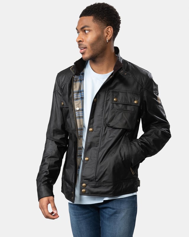 The Racemaster jacket in Faded Olive. There’s more to the Racemaster than meets the eye. Introduced back in 1981, it was originally billed as a shorter version of the iconic Trialmaster. This means that, along with the history, heritage, and dark navy 6 oz. waxed cotton, you also get increased mobility and freedom to move.

6 oz. waxed cotton, with a unique blend of micro and technical waxes
Four external pocket field jacket with reinforcement patches and corduroy details
Water-repellent and wind-repellent
Corduroy linings at the collar, cuffs and hem providing added comfort and resilience at high contact points
Signature antique brass metal hardware with Belstaff England engraved on the round and signature phoenix woven patch on left sleeve
Centre front zip closure with snap closure placket
Buckle-adjusted collar
Two press-stud flap pockets
Two lower zipped pockets
Left internal pocket

Shell: 100% Cotton, Body Lining: 100% CottonSleeve Lining: 55% Polyester, 45% Viscose/Rayon105306