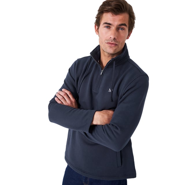 A brand-new take on a half zip sweatshirt in taupe. Everything we do is designed with the British coast in mind – and it rings especially true with this style. With a funnel collar to warm you from the sea breeze and pockets for stashing essentials, it’s just what you need for long brisk walk.