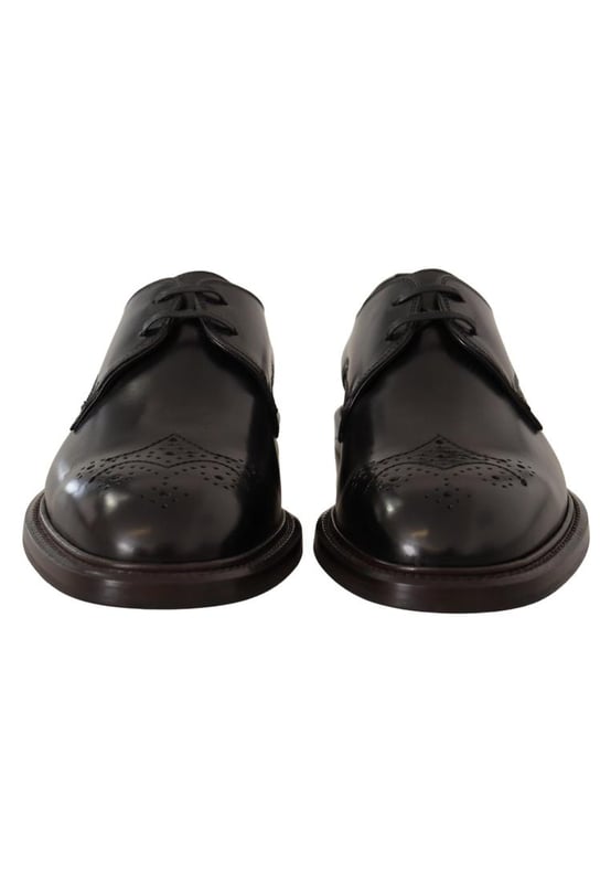 Dolce & Gabbana Men's Black Leather Dress Formal Derby Shoes Model: Dress derby shoes
Color: Black
Material: 100% Calfskin Leather
Rubber sole
Logo details
Made in Italy
Very exclusive and high craftsmanship