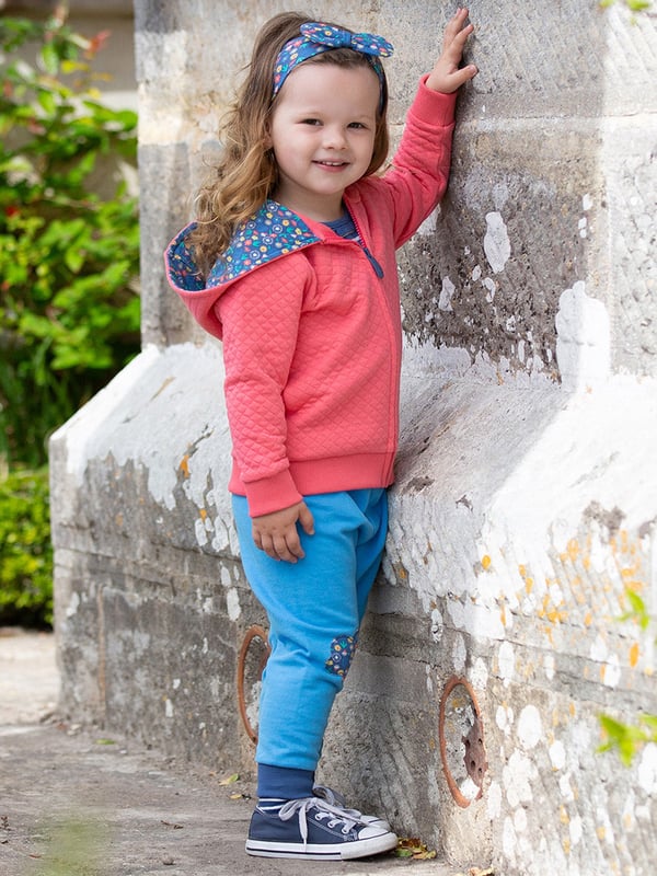 NEW! Our fabulous fossil hoody in coral pink is rather special, it uses our brand new soft and sculptured fossil fabric which provides a fab quilted effect. Enclosed in a layer of polyester fibres inside an organic cotton 'sandwich' it creates a lightweight yet warm layer, perfect for cooler days.