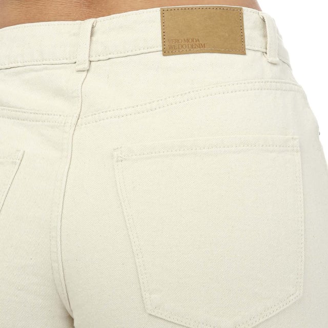Womens Vero Moda Zuri High Rise Loose Denim Shorts in ecru.- 5-pocket construction.- Zip fly and button fastening.- Turn-up hems.- High waist - rise = 11in.- Loose fit.- Inside leg length measures 5in approximately.- 100% Cotton.  Machine washable.- Ref: 10279493