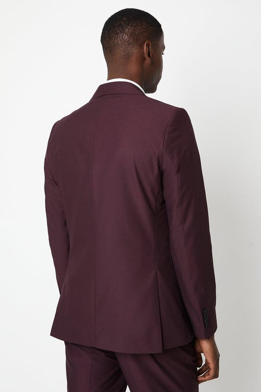 Slim, tailored fit for a sharp, modern silhouette
Two-button, single-breasted jacket with notched lapels
Sleek, streamlined design with minimal detailing
Premium, lightweight fabric with a hint of stretch
Versatile burgundy hue suitable for smart occasions

Exuding refined sophistication, this slim fit suit jacket from Burton is the epitome of contemporary tailoring. The sleek, streamlined silhouette hugs the body for a sharp, modern look that's perfect for smart casual events or formal occasions. Pair with tailored trousers and a crisp shirt for a polished ensemble that radiates confidence and style. The premium, lightweight fabric with a touch of stretch ensures a comfortable yet impeccable fit, allowing for ease of movement. Whether attending a wedding, business meeting, or evening soiree, this versatile jacket will have you looking dapper and on-trend.