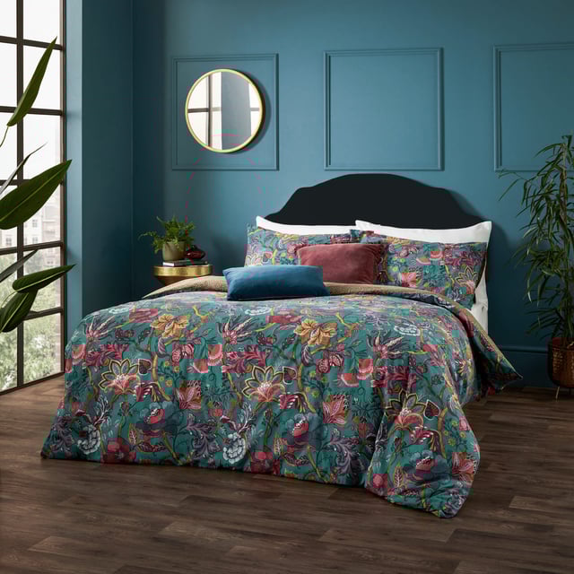 This exotic contemporary floral, inspired by the arts and crafts movement, captures an essence of escapism and mystique. Blending a rich palette of colours with intriguing flowers, patterns, and shapes perfectly encapsulates the essence of Wylder Tropics. Complete with a spotted tonal reverse, providing you with two distinct looks for a midweek refresh. This duvet cover is printed on a soft cotton-rich fabric with a textured slub finish, giving it a relaxed look that will last.