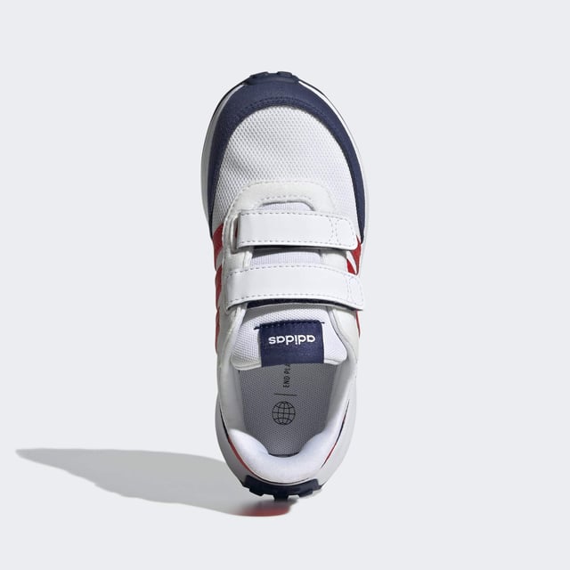 Bring your child a touch of the old school. These kids' adidas sneakers are inspired by '70s running shoes and have two hook-and-loop straps to ensure those feet stay in place. The Cloudfoam midsole is soft and cushiony to keep them comfortable throughout the day. Suede overlays on the toe and heel add a touch of nostalgia and texture to the look. Made with a series of recycled materials, and at least 50% recycled content, this product represents just one of adidas' solutions to help end plastic waste.  - Regular fit - Hook-and-loop closure - Closed mesh upper - Textile lining - Toe and heel protective overlays - Cloudfoam midsole - Rubber outsole - Upper contains a minimum of 50% recycled content  Shipped by adidas