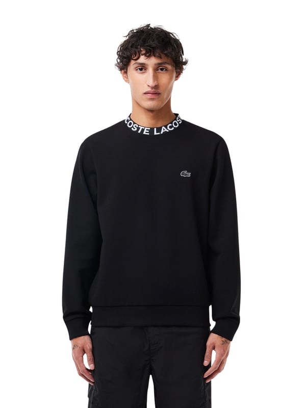 Das Lacoste Herren-Sweatshirt mit Rundhals, Logo-Jacquard-Kragen und elastischem Bund bietet einen einzigartigen Mix aus Eleganz und Komfort. Die Krokodil-Applikation und der Classic Fit verleihen diesem unifarbenen Sweatshirt einen zeitlosen Stil für einen mühelos lässigen Auftritt.