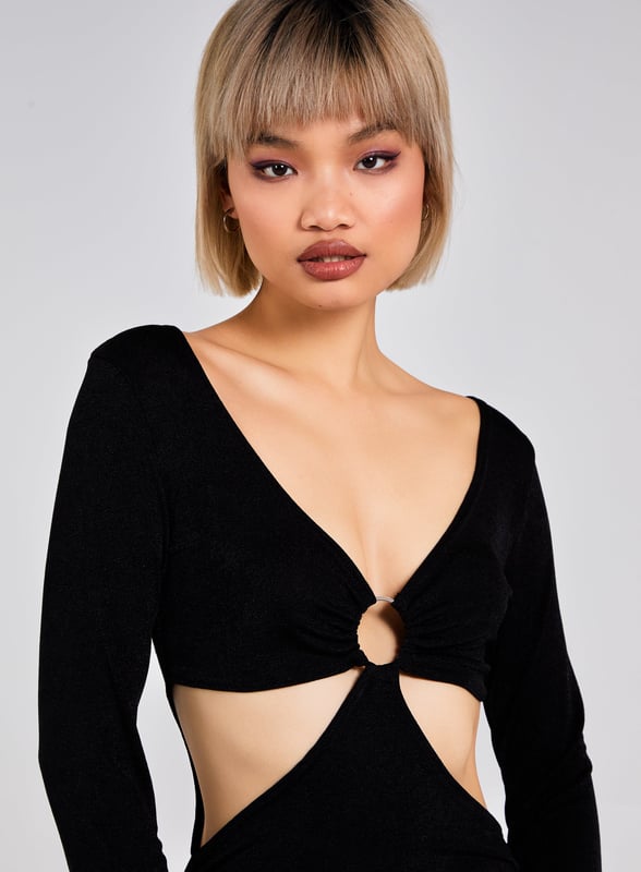 Show off a little skin this season with this sexy slinky little number. 95% Polyester, 5% Elastane Wash With Similar Colours Iron On Reverse Do Not Dry Clean
