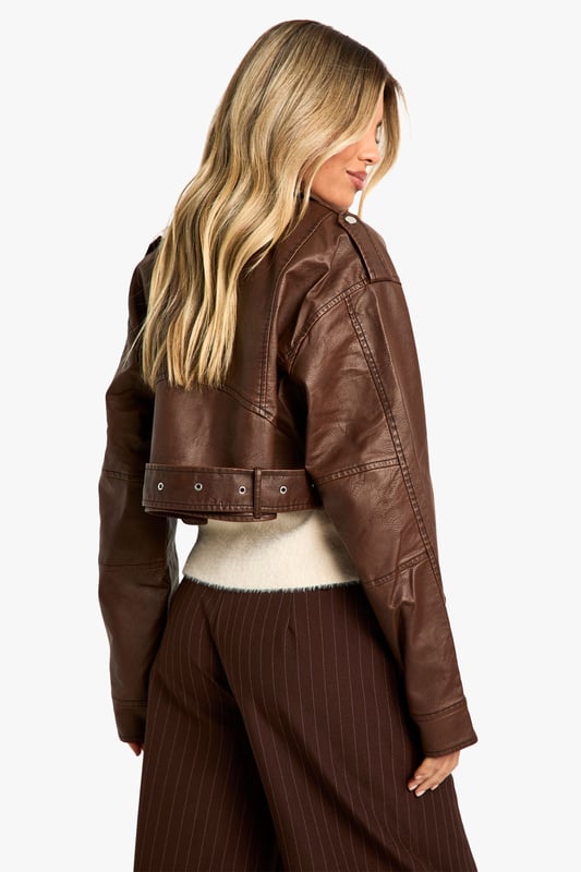 A short, close-fitting jacket complete with zips and stud detailing, rock some seriously cool vibes on the day-to-day with a biker jacket. Whether you prefer cropped, longline or a classic oversized shape for vintage vibes, biker jackets are a wardrobe classic that's perfect for edging up your outfit. Layer up your dress with a suede biker jacket, or show off your shape with a black biker jacket that's both timeless and flattering.Style: Biker JacketFabric: Faux LeatherLength: CroppedSleeve Length: Long SleeveModel's height: 175cm / 5'9"