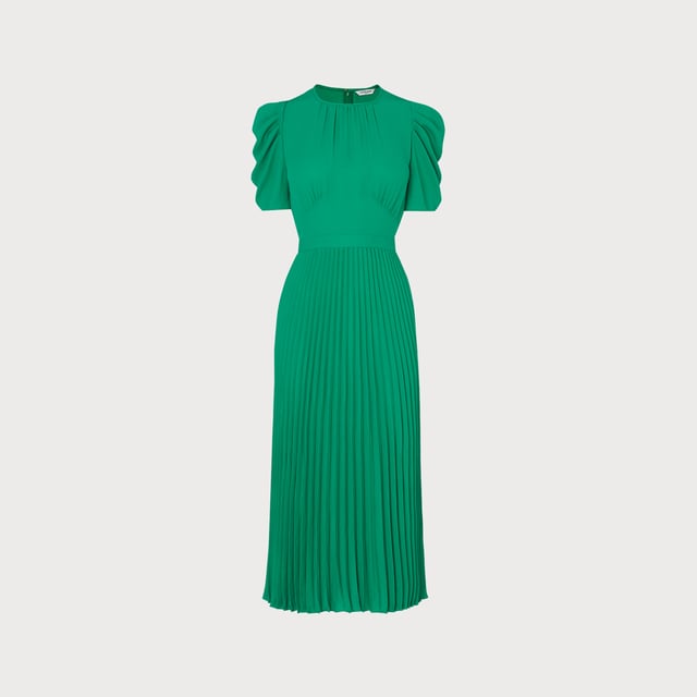 Full of vintage charm, our Avalon dress is a modern interpretation of beautiful Thirties' dress shapes. Crafted from stylish crepe in bright green, it has a round neck with pleat detail, folded short sleeves, pleating at the bust, a nipped waist and falls to a midi-length pleated skirt. Wear with a tweed jacket early in the season or with strappy heels for spring occasions.