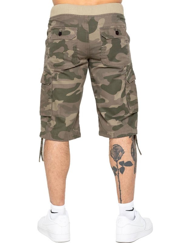 Effortlessly stylish and luxurious, Enzo offers Enzo Mens Camo Combat Cuffed Shorts with an elasticated waist featuring a drawcord and secured by a sophisticated button. These shorts are available in 3 elegant colours: Beige, Grey, and Vintage. The mid-rise design and ribbed waist add a touch of sophistication, while the 2 front pockets, 2 buttoned back pockets, and 2 velcro side pockets provide both function and fashion.