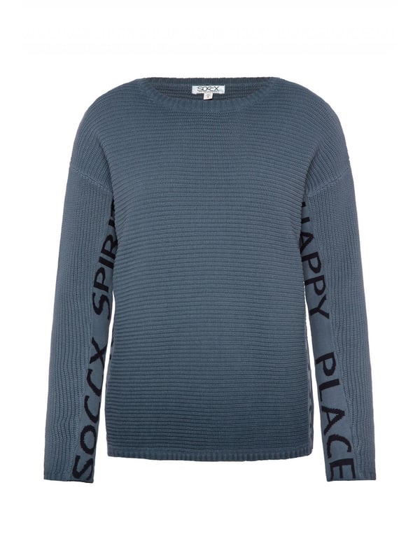 Deze gebreide trui met ronde hals voor dames is de perfecte metgezel voor koelere dagen. Hij is gemaakt van zacht materiaal dat comfortabel aanvoelt op de huid en uitnodigt tot behaaglijkheid. De trui is gemaakt in een structuurmix en heeft grof gebreide en fijn gebreide delen. De manchetten en zoom hebben een geribde look. De afgezakte schouders en de gebruikte kleur geven de trui een casual look. Aan de zijkanten en op de mouwen zitten gebreide letters.