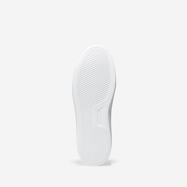 We've given our much-loved, signature GrandPro Rally Court Sneaker an update in organic canvas. Crafted from high-end-yet-durable materials, it features a luxuriously cushioned GRANDFOAM footbed, an EVA outsole, and a classic old-school sneaker vibe