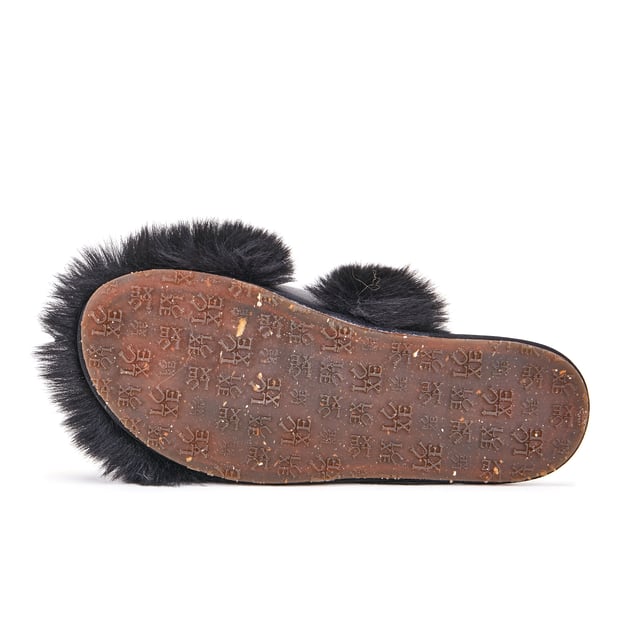 Luxe faux fur/black leather upper
Leather lining
Rubber sole