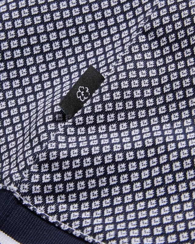 Make way for AFFRIC. With plenty of style to go around, this classic polo is just what your wardrobe needs. Pair it with chinos, jeans or tailored trousers for a multitude of looks.


Polo shirt
Geometric design
100% Cotton
Short sleeved
Classic collar
Striped trims







100% Cotton
&nbsp;
263994






&nbsp;
&nbsp;